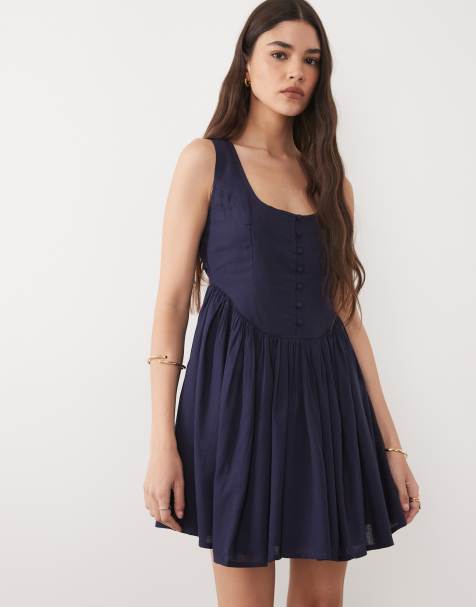 Nobody's Child - Cora - Robe courte sans manches avec jupe froncée et corsage travaillé - Bleu marine - view 1