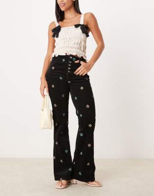 corduroy embroidered kick flare pants in black - part of a set-Multi