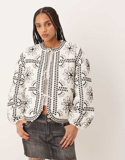 Nobody's Child Lara embroidered quilted jacket with tie-detail in black and white