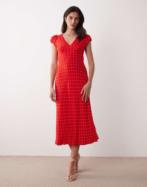 Nobody's Child - Lina - Vestito midi vaporoso rosso a pois con maniche ad aletta e scollo a V - view 1