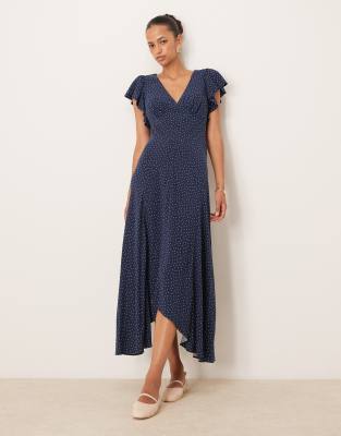 Loubelle frill sleeve midi dress in navy polka dot