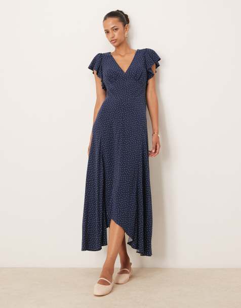 Nobody's Child - Loubelle - Midi-jurk met ruches aan de mouwen en stippenprint in marineblauw - view 1