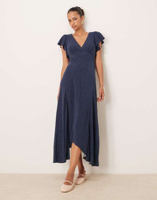Nobody's Child - Loubelle - Midi-jurk met ruches aan de mouwen en stippenprint in marineblauw