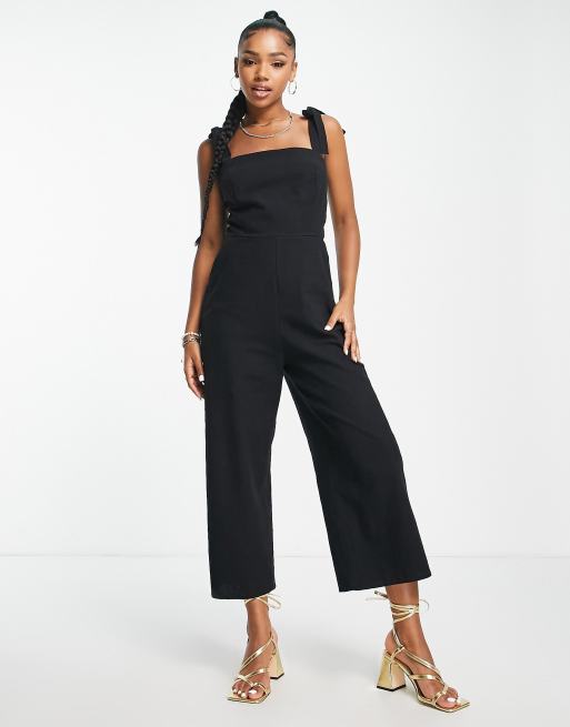 Black jumpsuit and heels online