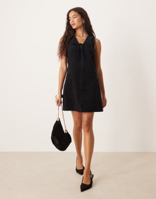 Nila - Robe chasuble courte en velours côtelé avec détail noué - Noir 50