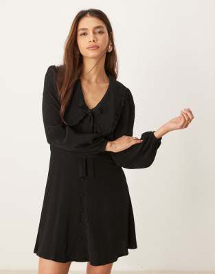 Ottilie bow detail long sleeve mini dress in black