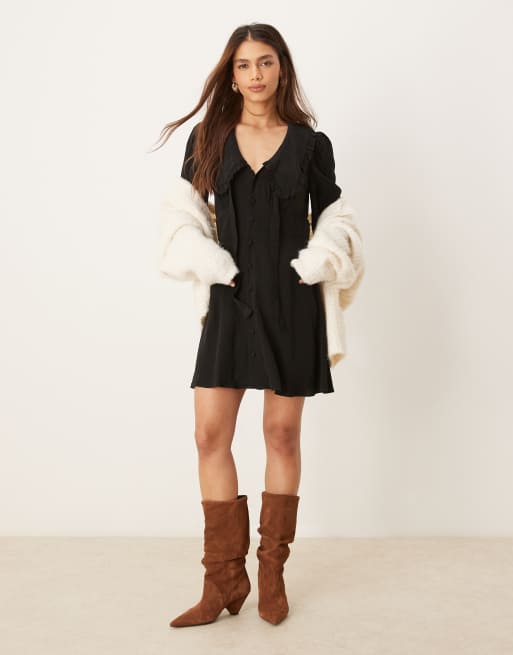 Nobody's Child Ottilie bow detail long sleeve mini dress in black | ASOS