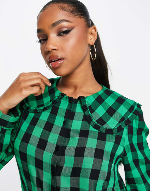 green and black blouse