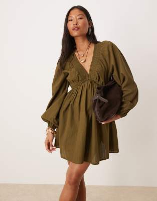 Nobody’s Child Petite Nobody's Child Petite Irene balloon sleeve boho mini dress in khaki-Green