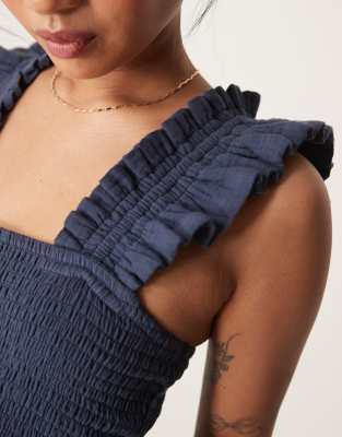 Nobody's Child Petite Maya Ruffle Sleeve Jumpsuit In Navy