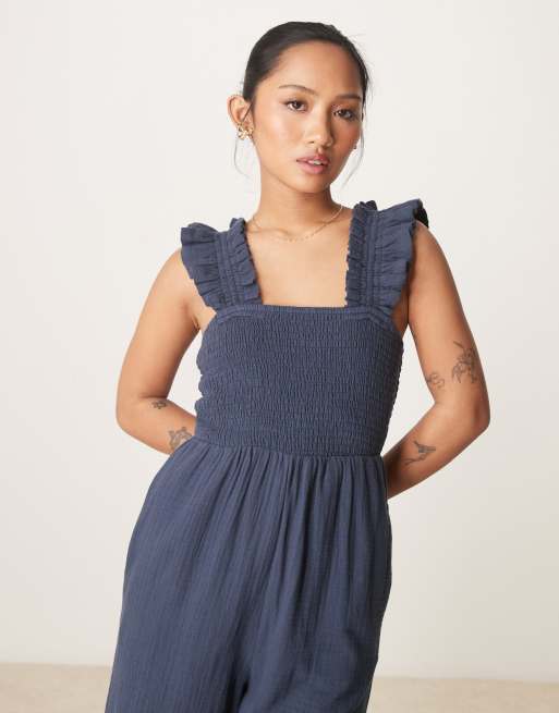 Nobody's Child Petite Maya ruffle sleeve jumpsuit in navy