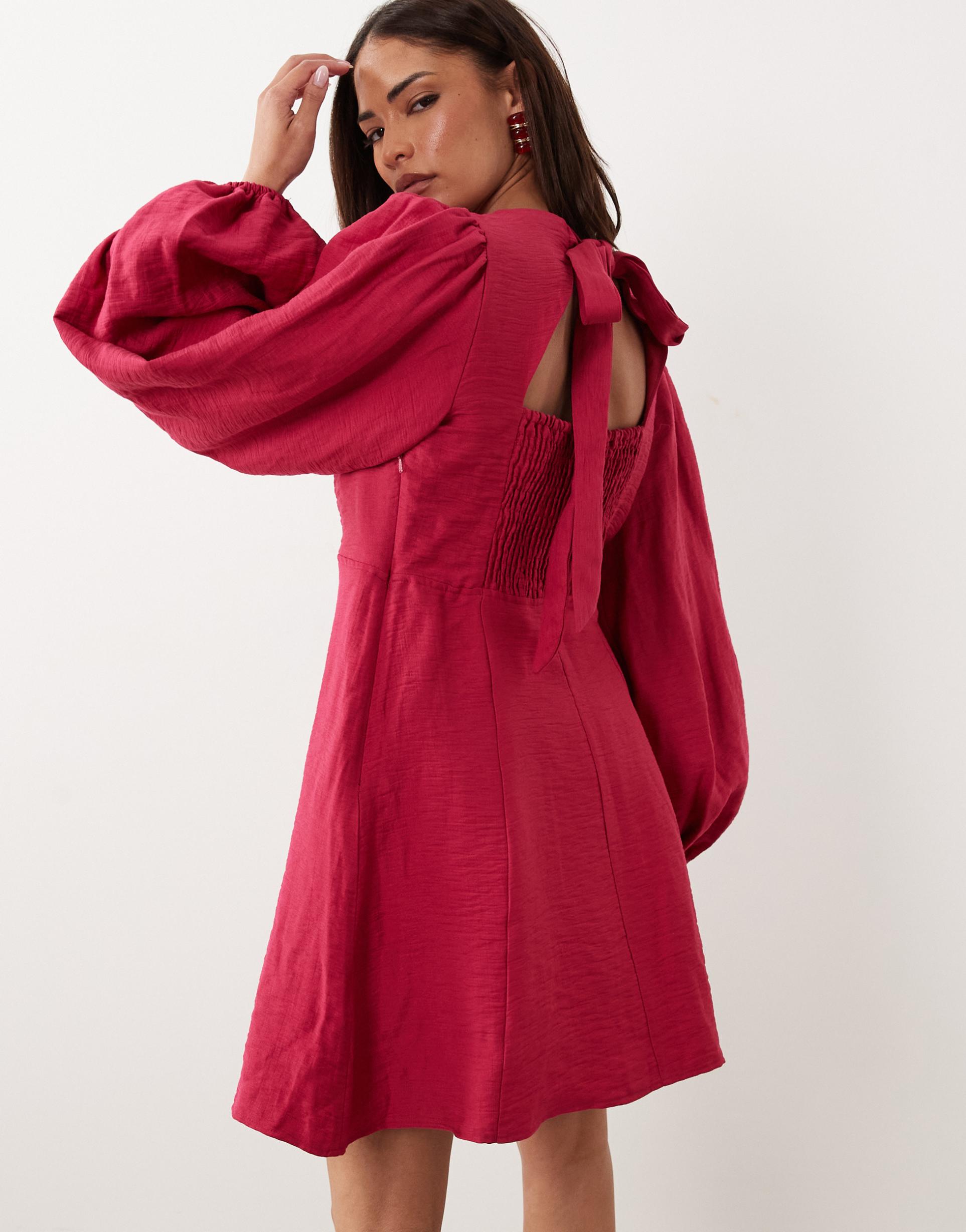 nobody's child petite nicki round neck long sleeve open back detail mini dress in red