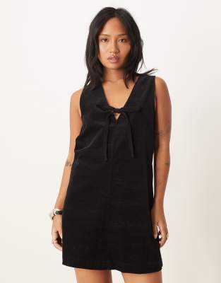 Nobody's Child Petite Nila Tie-detail Corduroy Pinafore Mini Dress In Black