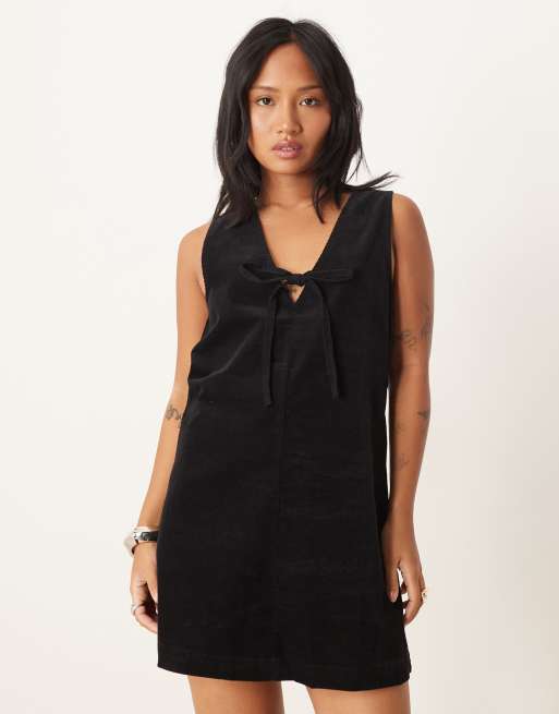Nobody's Child Petite Nila tie-detail corduroy pinafore mini dress in black