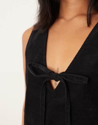 Nobody's Child Petite Nila Tie-detail Corduroy Pinafore Mini Dress In Black