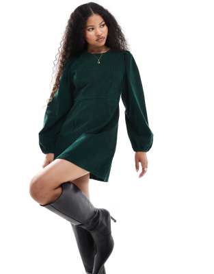 Patras corduroy mini dress with balloon sleeves in forest green