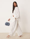 [Nobody's Child Petite] Nobody's Child Petite Reese wide leg pants in white with blue side stripe 14 White/Blue