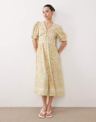 Saffy - Robe mi-longue à fleurs - Citron-Jaune 40