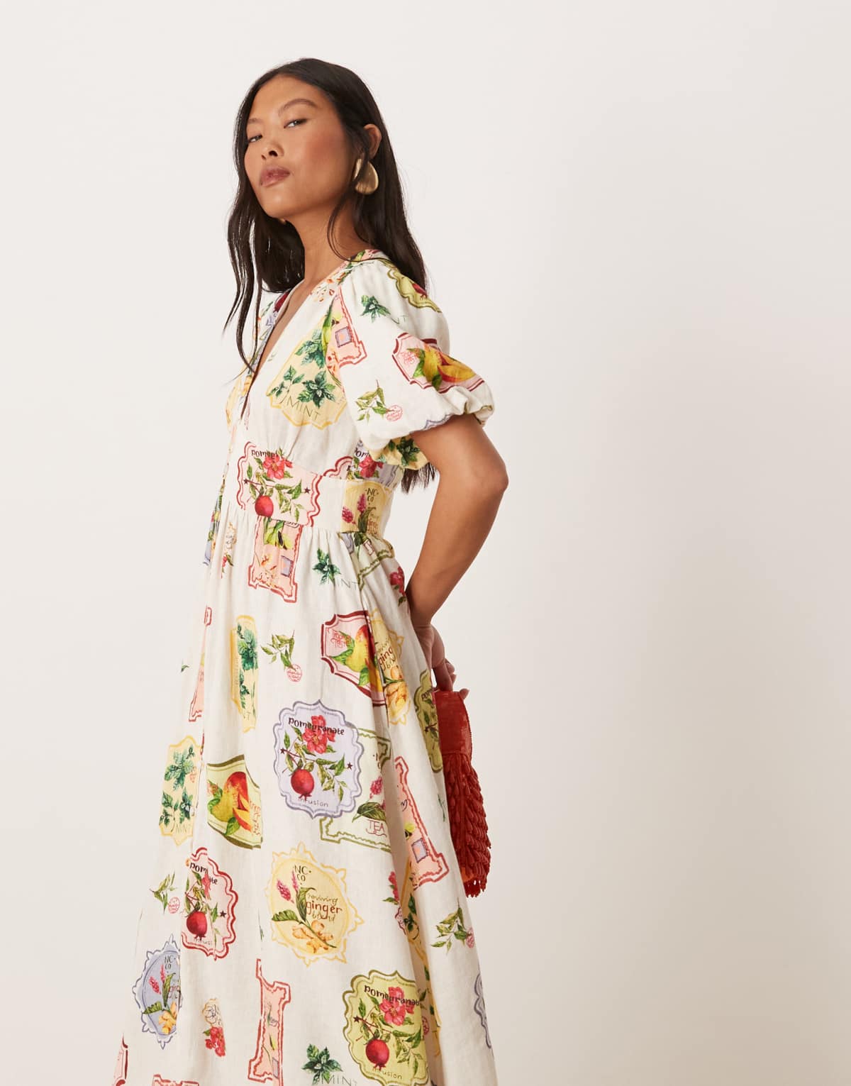 Nobody's Child Petite Starlight puff sleeve midi dress in postcard fruit print