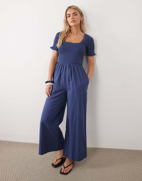 Nobody's Child Petite – Zita – Kurzärmliger Baumwoll-Jumpsuit in Mittelblau mit gesmoktem Oberteil und weitem Bein - view 1