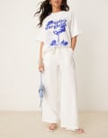 [Nobody's Child] Nobody's Child Reese wide leg pants in white with blue side stripe 12 white