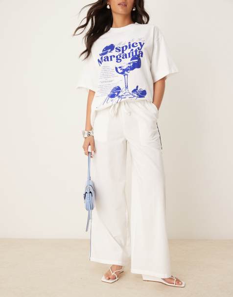 Nobody's Child Reese wide leg trousers in white with blue side stripe