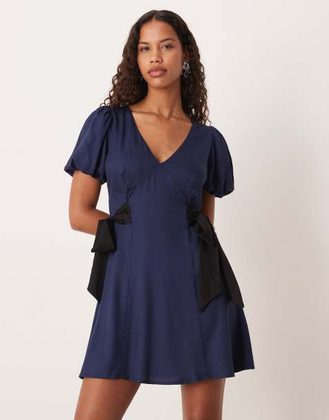 Nobody's Child Remi v-neck puff sleeve bow side mini dress in blue - view 1