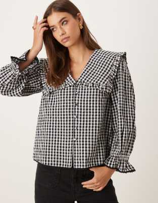Nobody's Child Ruffle High Neck Blouse In Animal Print