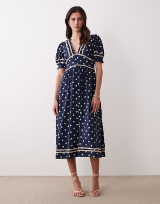 Nobody's Child - Saffy - Midikleid in Marineblau mit Puffärmeln und Polka Dots