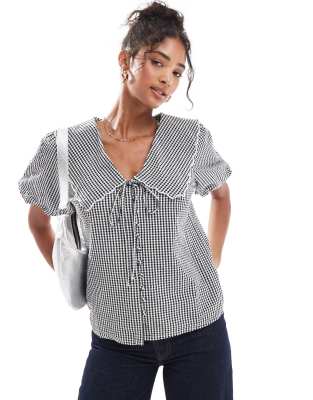 short sleeve birdie blouse in black plaid