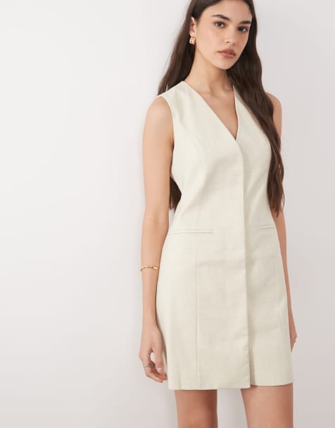 Nobody's Child sleeveless clean front tailored mini dress in cream - view 1