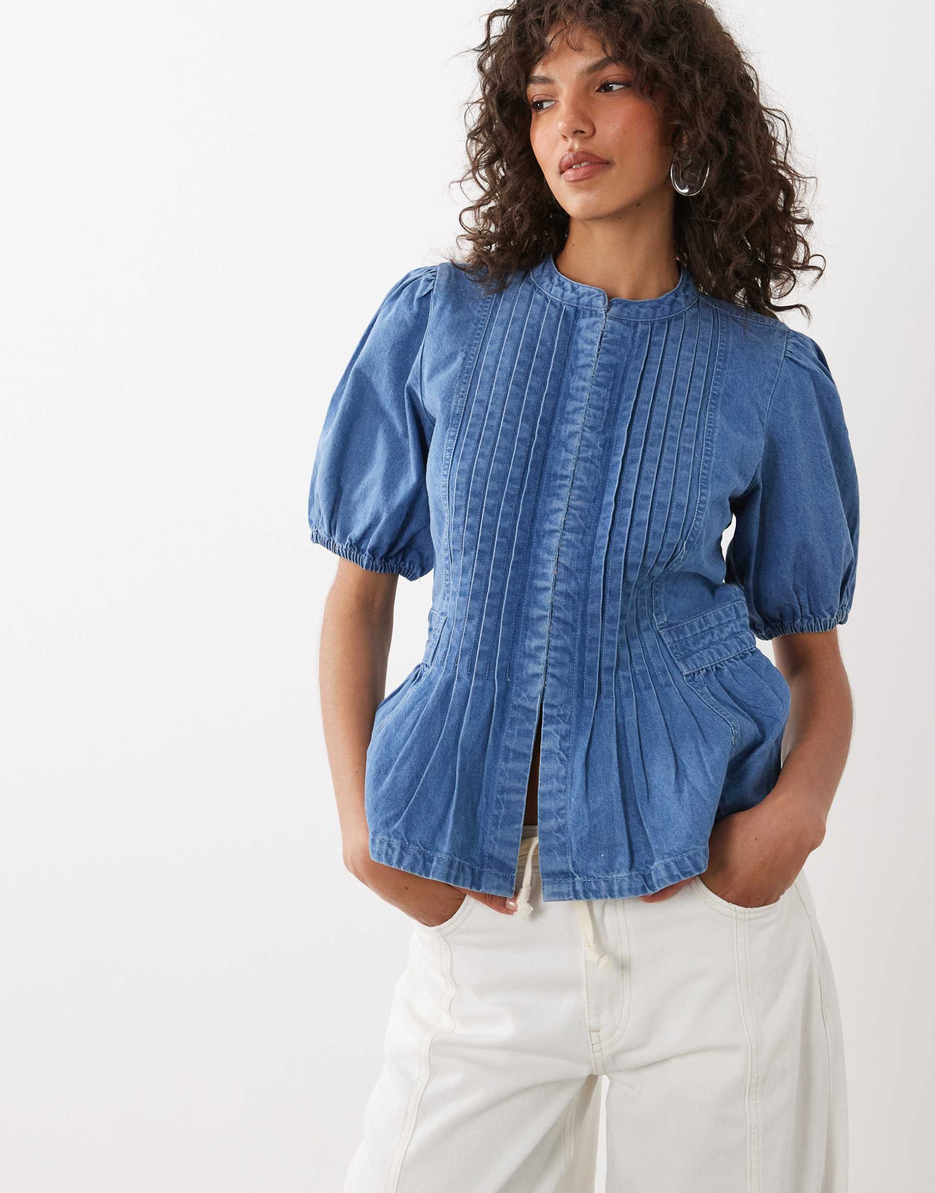 nobody's child tillie denim crew neck pleated front hook and eye detailing peplum top in blue