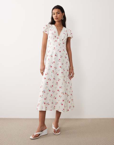Nobody's Child v-neck flutter sleeve tie back midi dress in ivory floral - view 1