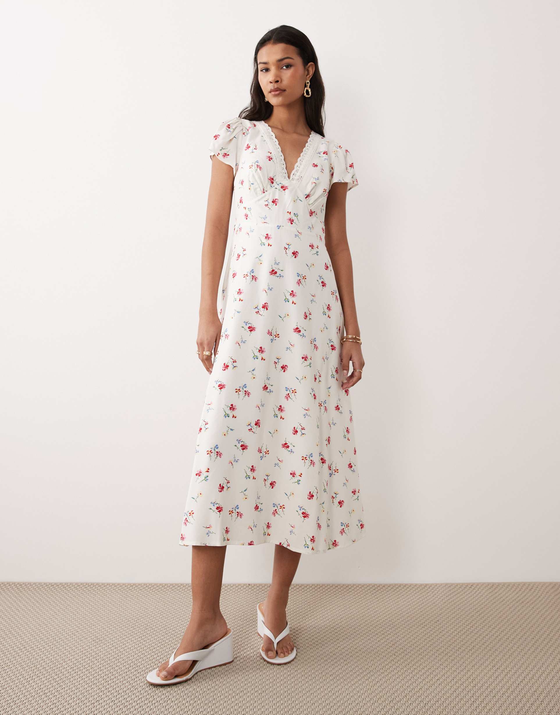nobody's child v-neck flutter sleeve tie back midi dress in ivory floral