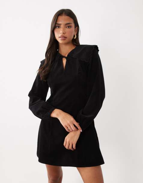 Nobody's Child - Vestido mini negro de corte oversize con cuello amplio y cierre delantero con lazo - view 1