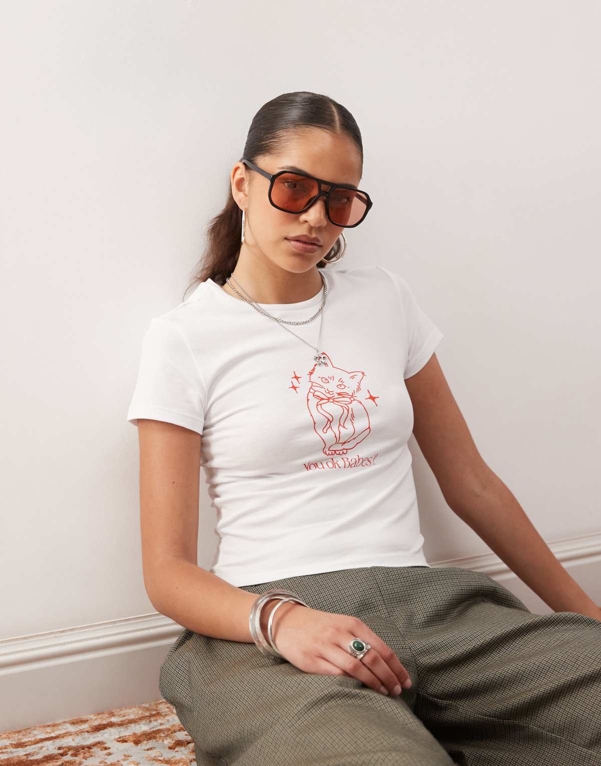 Noisy May baby tee with cat graphic in white