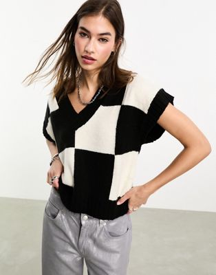 Noisy May checkerboard v neck knitted jumper vest in black and white