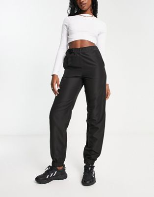 cuffed nylon pants in black