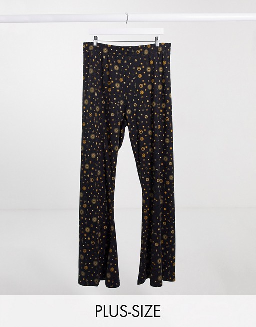 Noisy May Curve exclusive flares with high waist in cosmic print