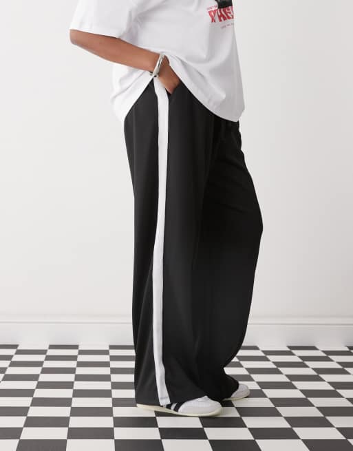 Noisy May Curve – Jogginghose in Schwarz mit weitem Bein und Seitenstreifen, 4 von 5