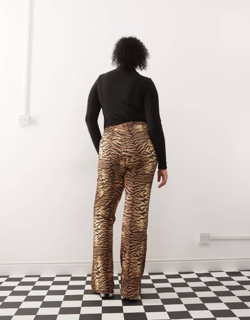 Noisy May Curve tiger print flare pants in brown
