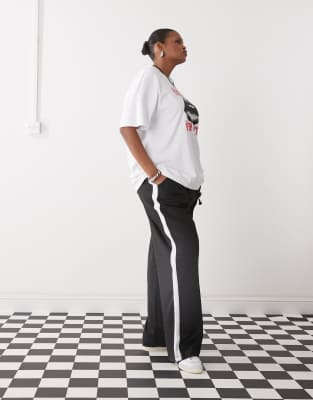 wide leg sweatpants with side stripe in black