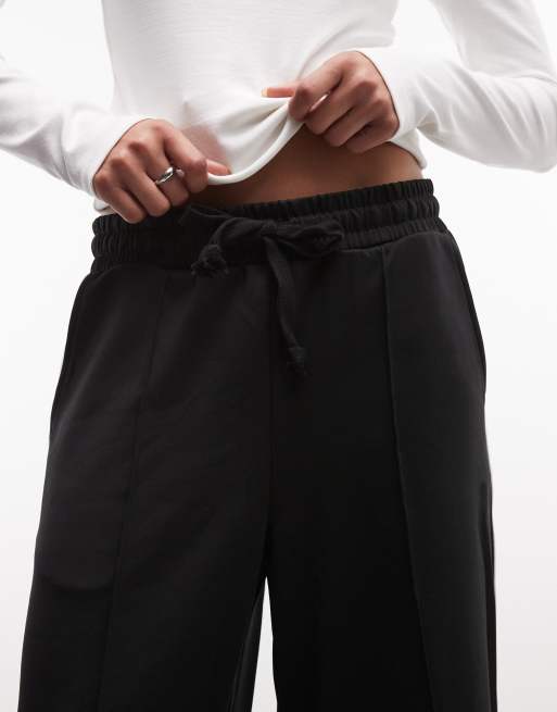 Noisy May – Gerade geschnittene Jersey-Hose in Schwarz mit weißem seitlichem Streifen, 3 von 5