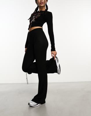 Shop Noisy May High Waisted Knitted Flared Pants In Black