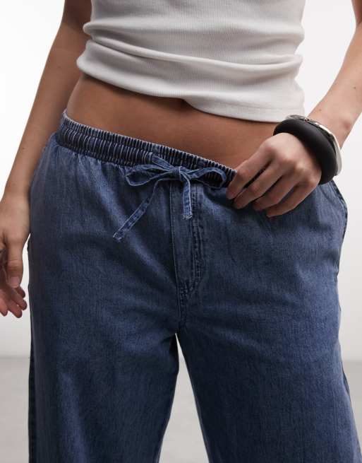 Noisy May – Jeanshose in verwaschenem Blau mit weitem Bein und Bindegürtel, 4 von 5