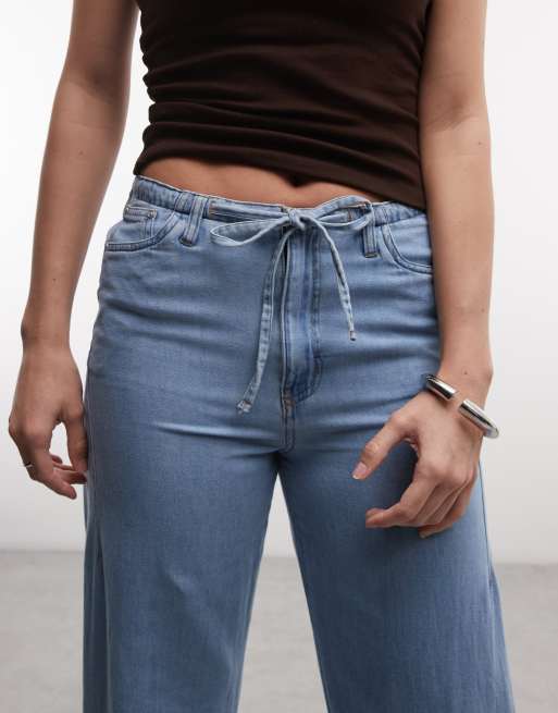 Noisy May – Ljusblå byxor i denim med vida ben och knytning i midjan, 3 av 5
