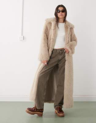 Noisy May - Longline-Mantel aus Kunstpelz in Beige-Neutral