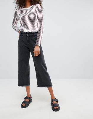 black cropped frayed jeans