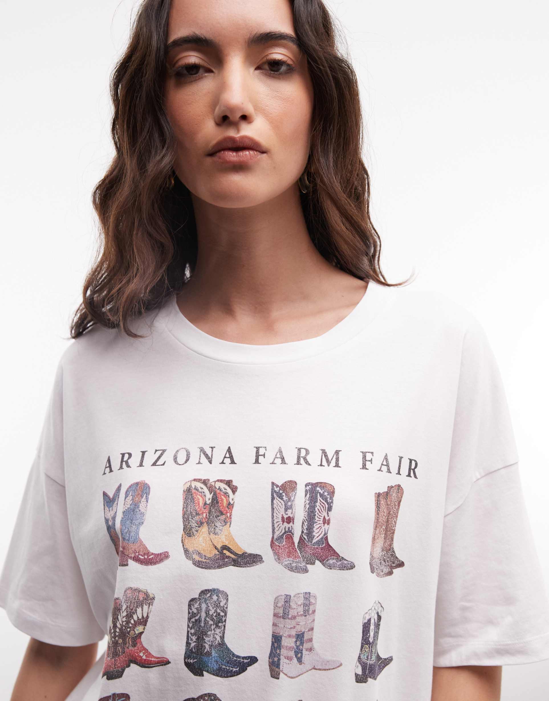 noisy may oversize t-shirt with cowboy boots graphic in white