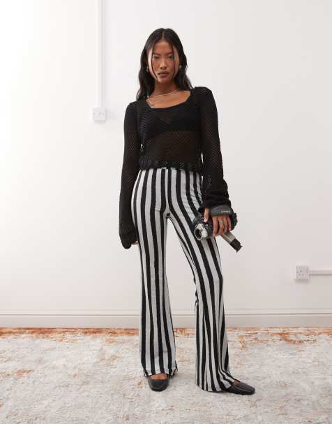 Noisy May Petite - Flare-legging in zwart met witte strepen - view 1